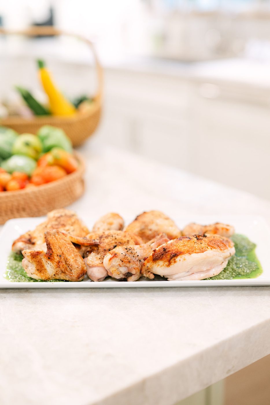 Roast chicken on a bed of herb sauce