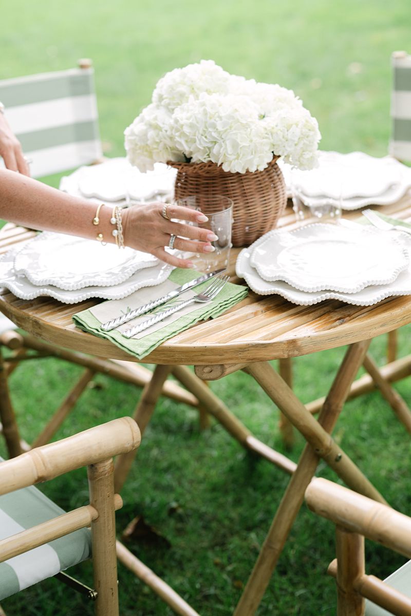 Setting the garden table with hydrangeas