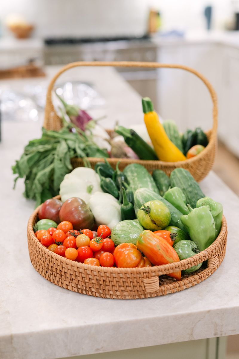 A harvest basket on the kitchen counter