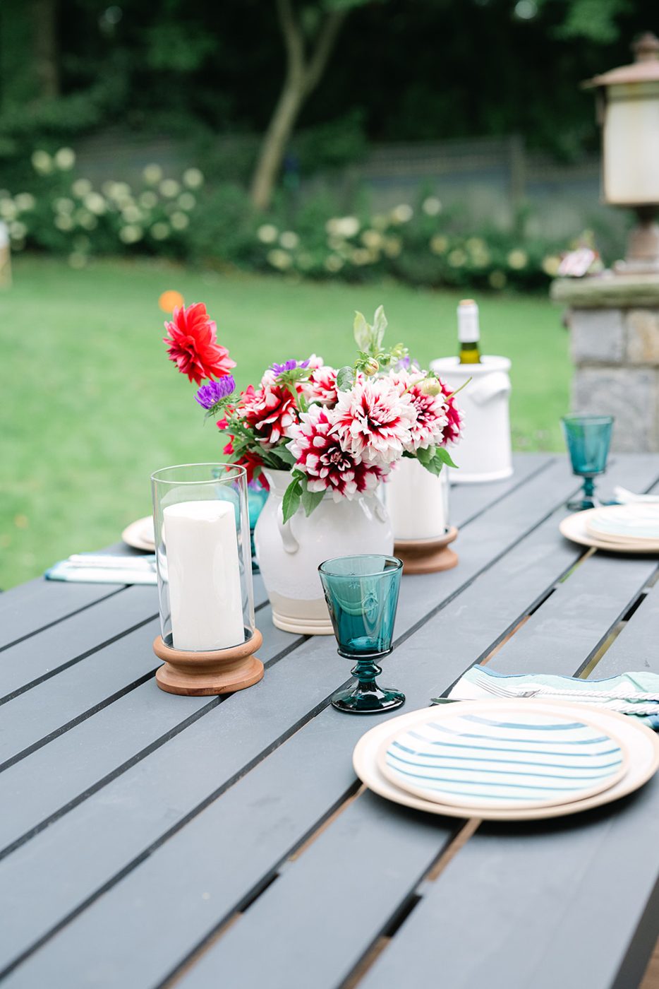 The table set with dahlias and candles